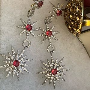 Swarovski crystal starburst drop earrings.